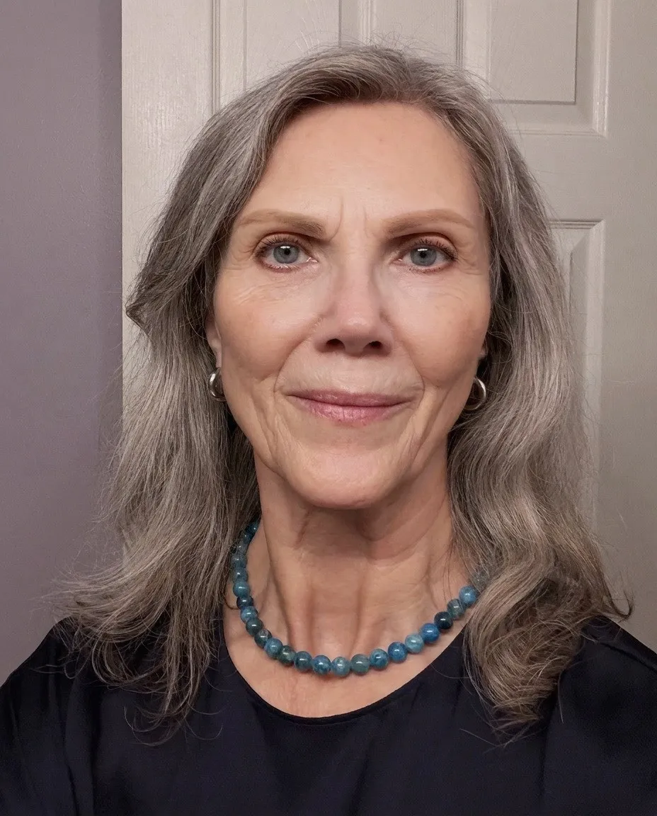 A customer wearing her Azul necklace by Simone Chagoya
